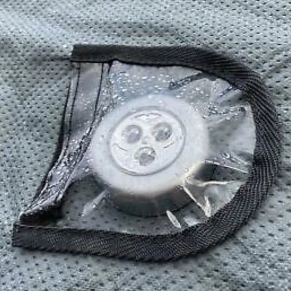 A close up image of the cover is shown, protecting the light.