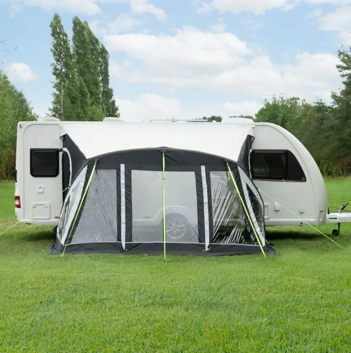 Full view of the Baywatch 390 air awning, see through to the Camper van.