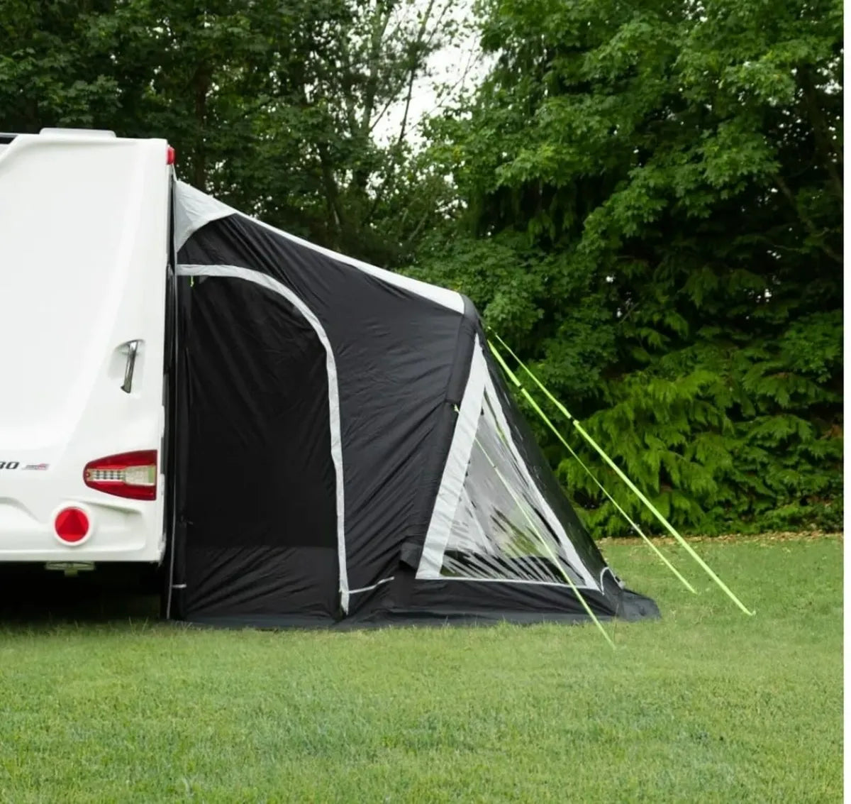 Side view of the Baywatch 390 air awning, in the outdoors.