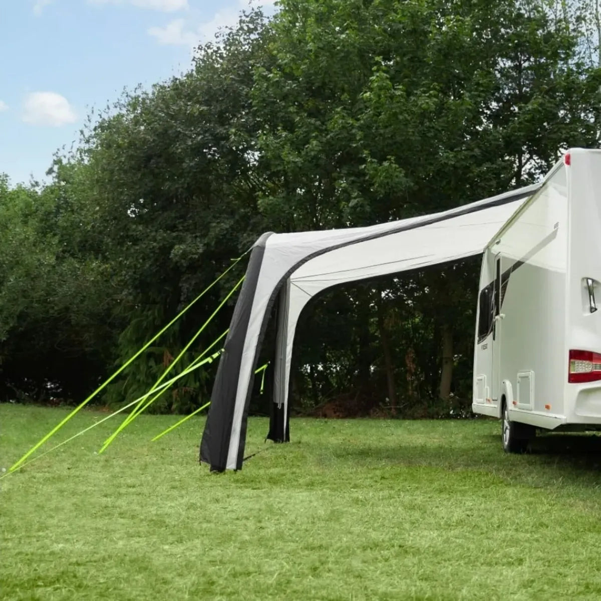 Side view of the Solar 4000 Air awning, connected to a caravan.